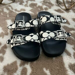Coach Black and White Slides  Women’s Size 9 
Worn approx six times